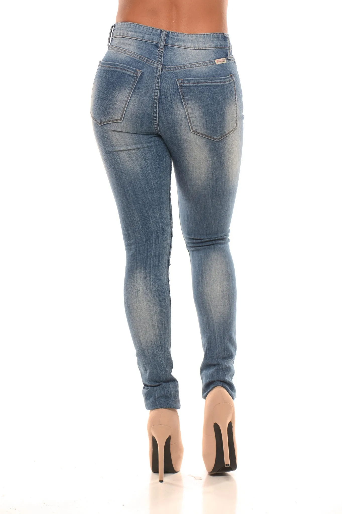 Mid Rise Distressed Medium Wash Jeans