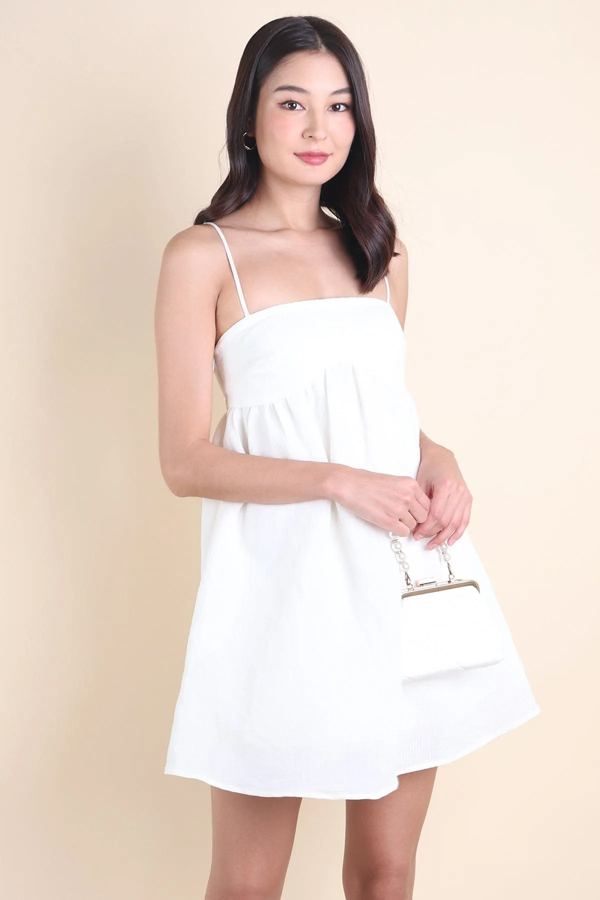 PICCO BABYDOLL TRAPEZE DRESS IN CREAMY WHITE